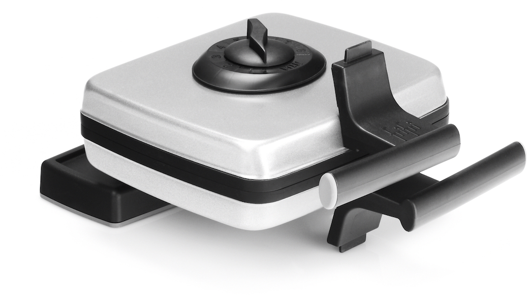 Silver waffle maker with a black handle and a dial on top, isolated on white.