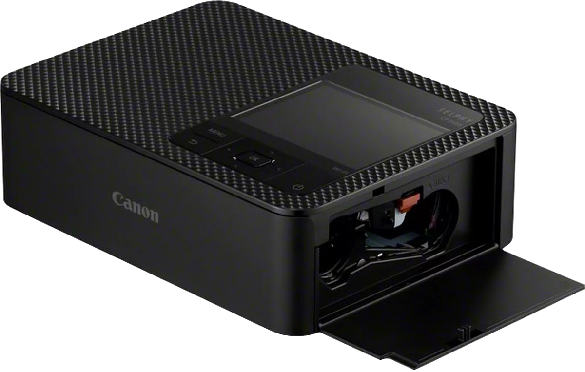 Fekete Canon SELPHY CP1300 nyomtató nyitott papírtálcával.