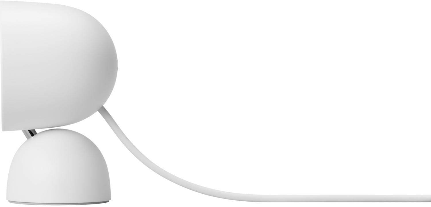 Appareil blanc de forme incurvée, et un câble blanc.