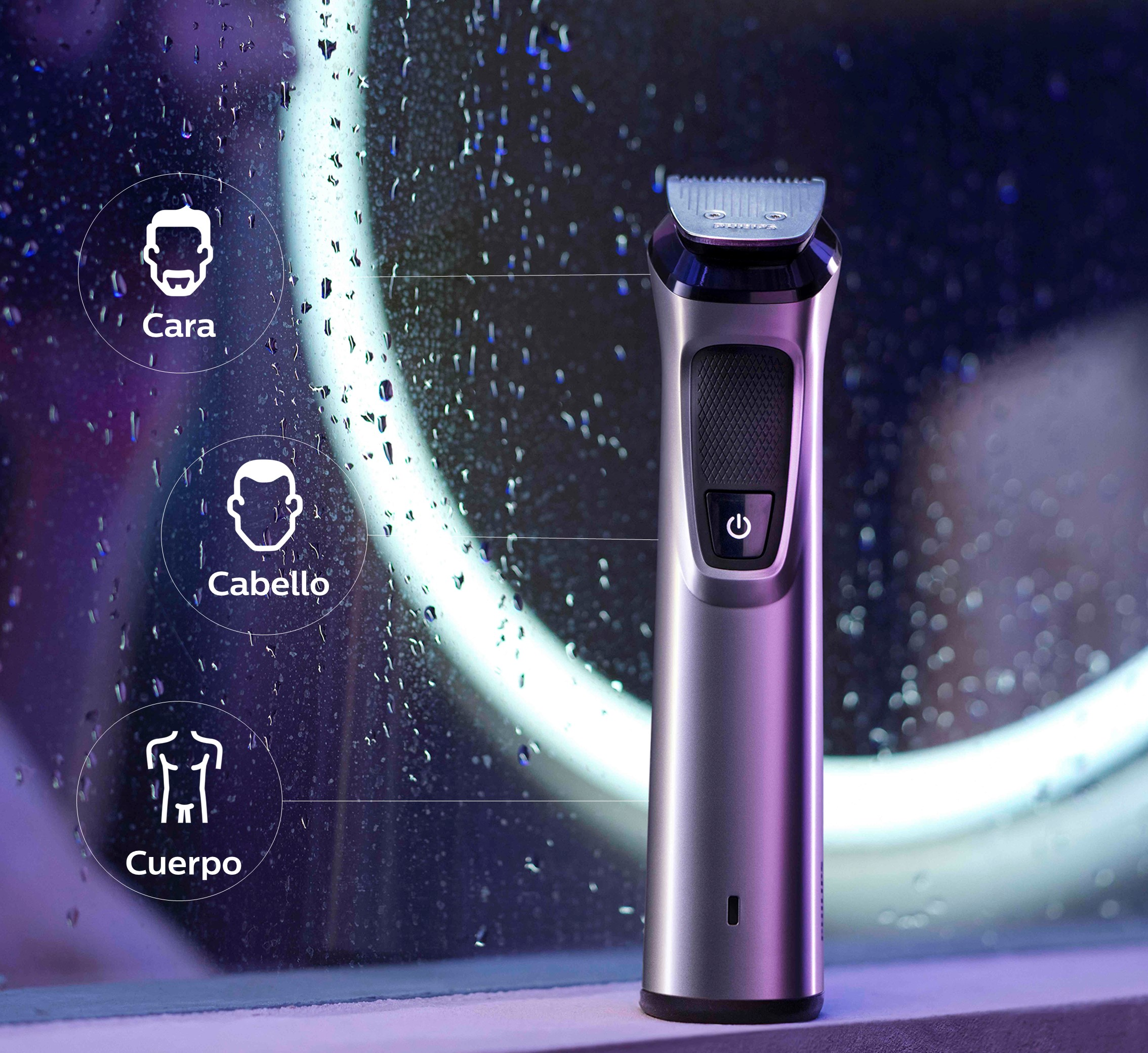 Afeitadora eléctrica plateada y negra con tres áreas etiquetadas: cara, cabello y cuerpo.