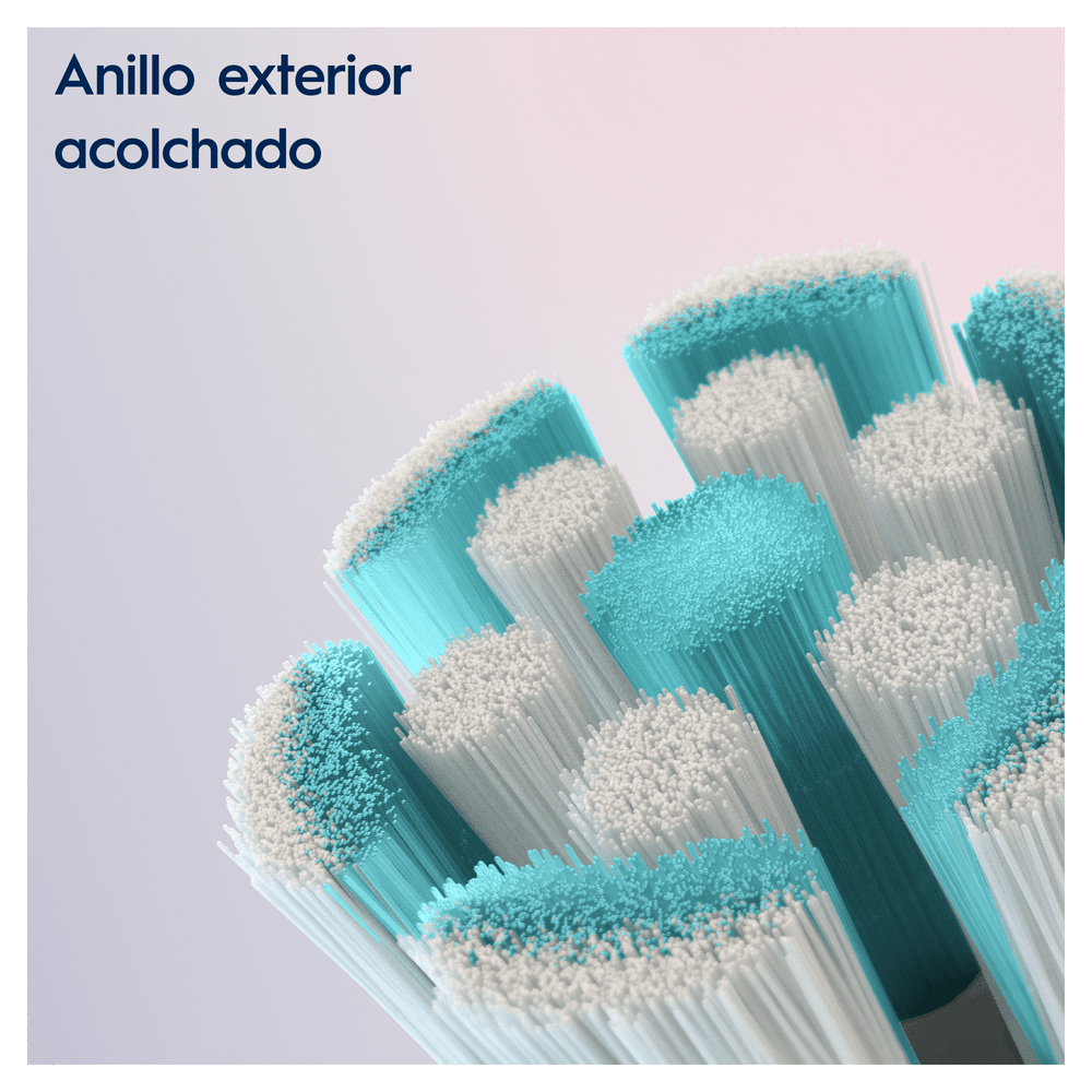 Primer plano del cabezal del cepillo de dientes con cerdas azules y blancas, enfoque en las cerdas.