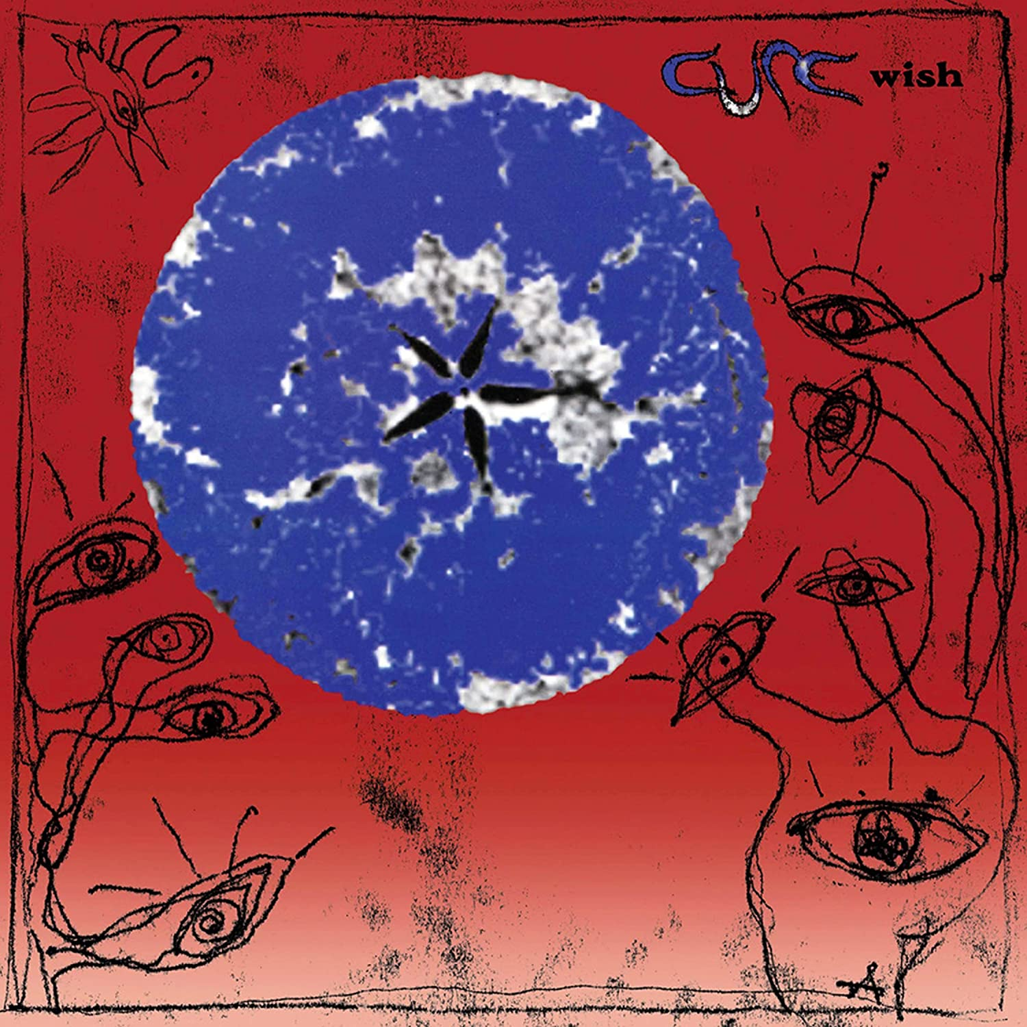A Cure album borítója kék körrel és szemekkel.
