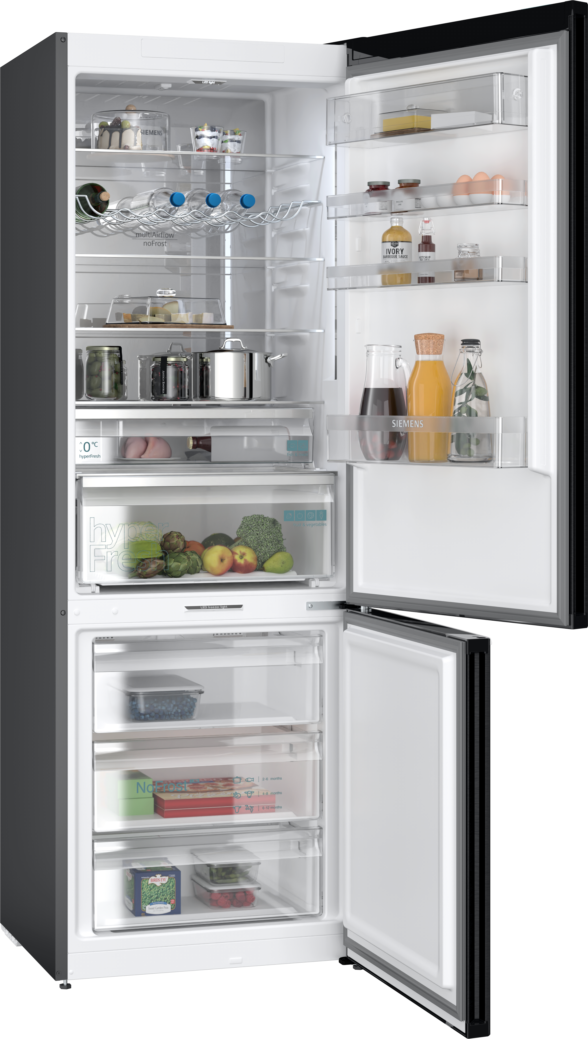 A Siemens refrigerator with the door open, showing food items inside.