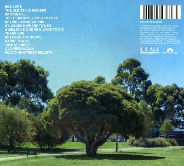 Albumcover: grüne Bäume, blauer Himmel, Songtitel und Text auf der Rückseite.