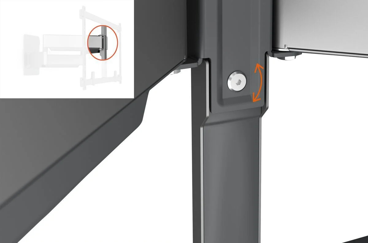 Close-up van een grijze metalen beugel met een schroef. Een pijl geeft de afstelrichting aan.