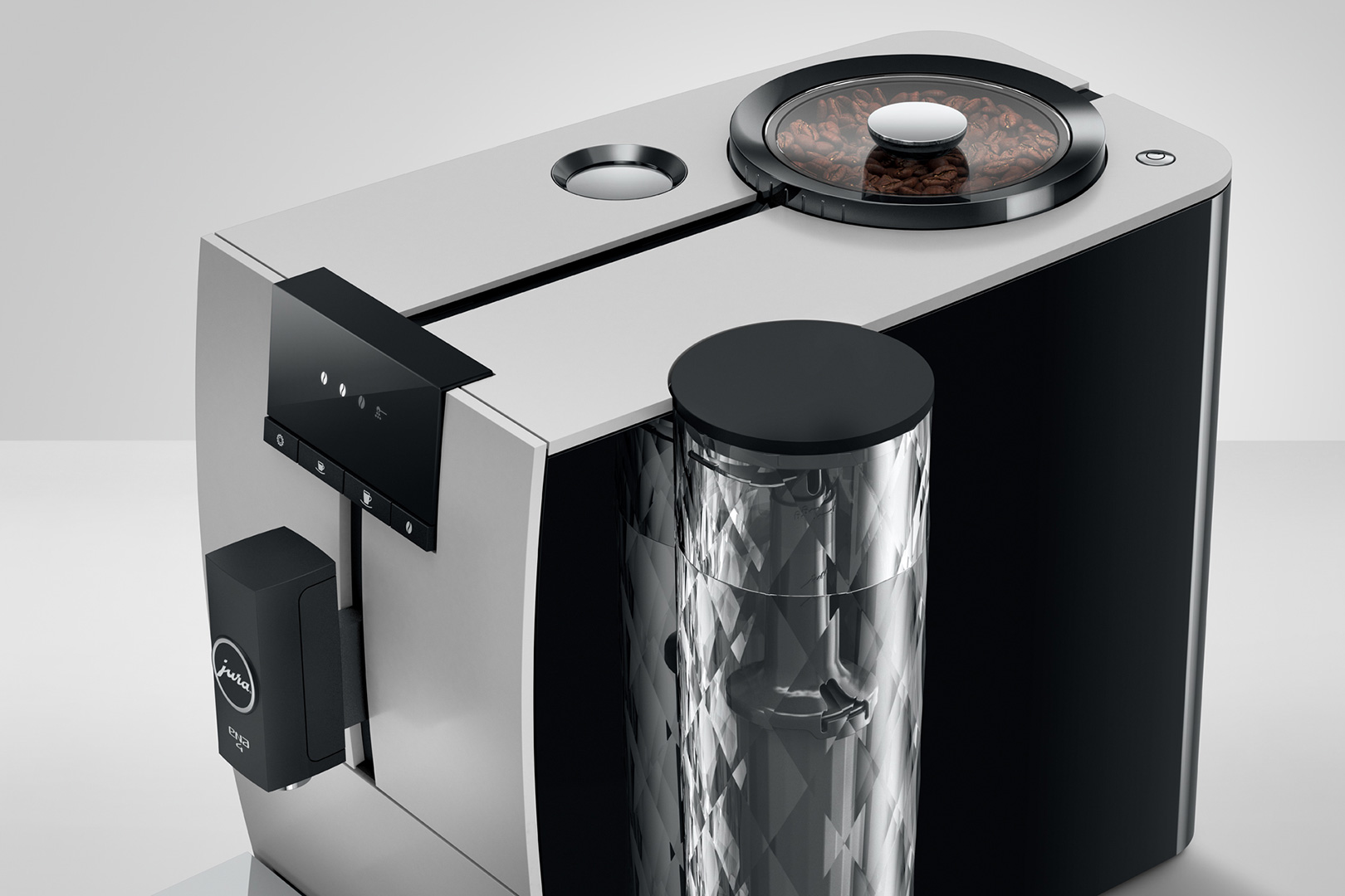 Gros plan sur une machine à café moderne. Comprend un récipient à grains, un réservoir d'eau et un panneau de commande.