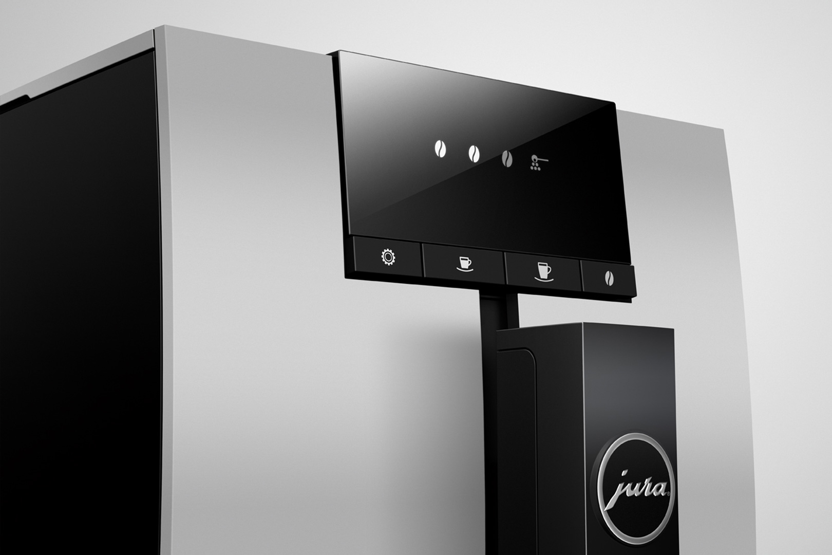 Une machine à café Jura noire et argentée, avec un panneau de contrôle noir et des icônes de tasses à café.