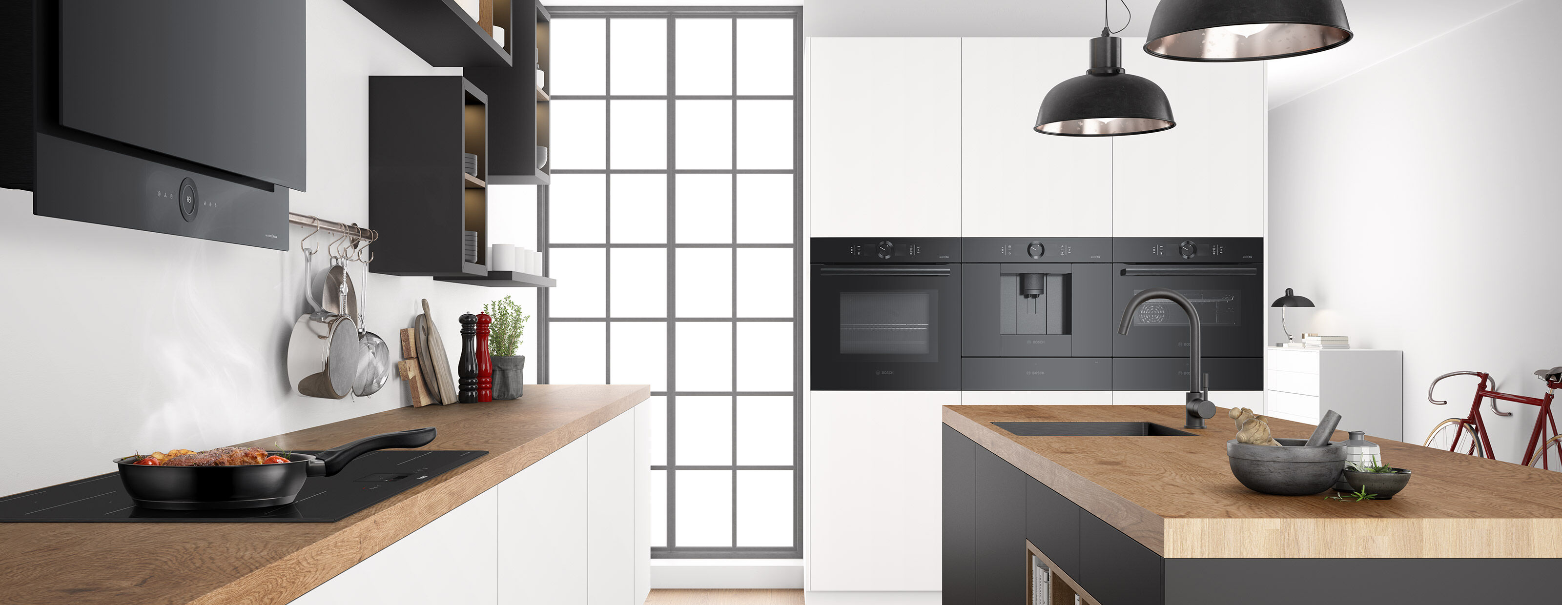 Kitchen interior with a wooden countertop and black appliances.