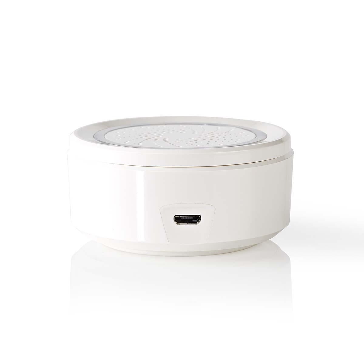 Weißes, zylindrisches Gerät mit USB-Anschluss. Oberseite perforiertes Design.
