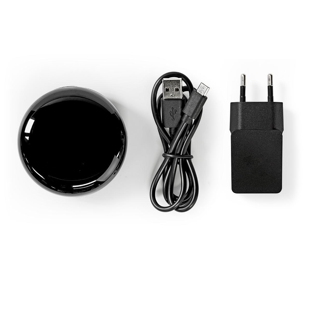 Schwarzes, kreisförmiges Gerät mit Ladekabel und Stecker.