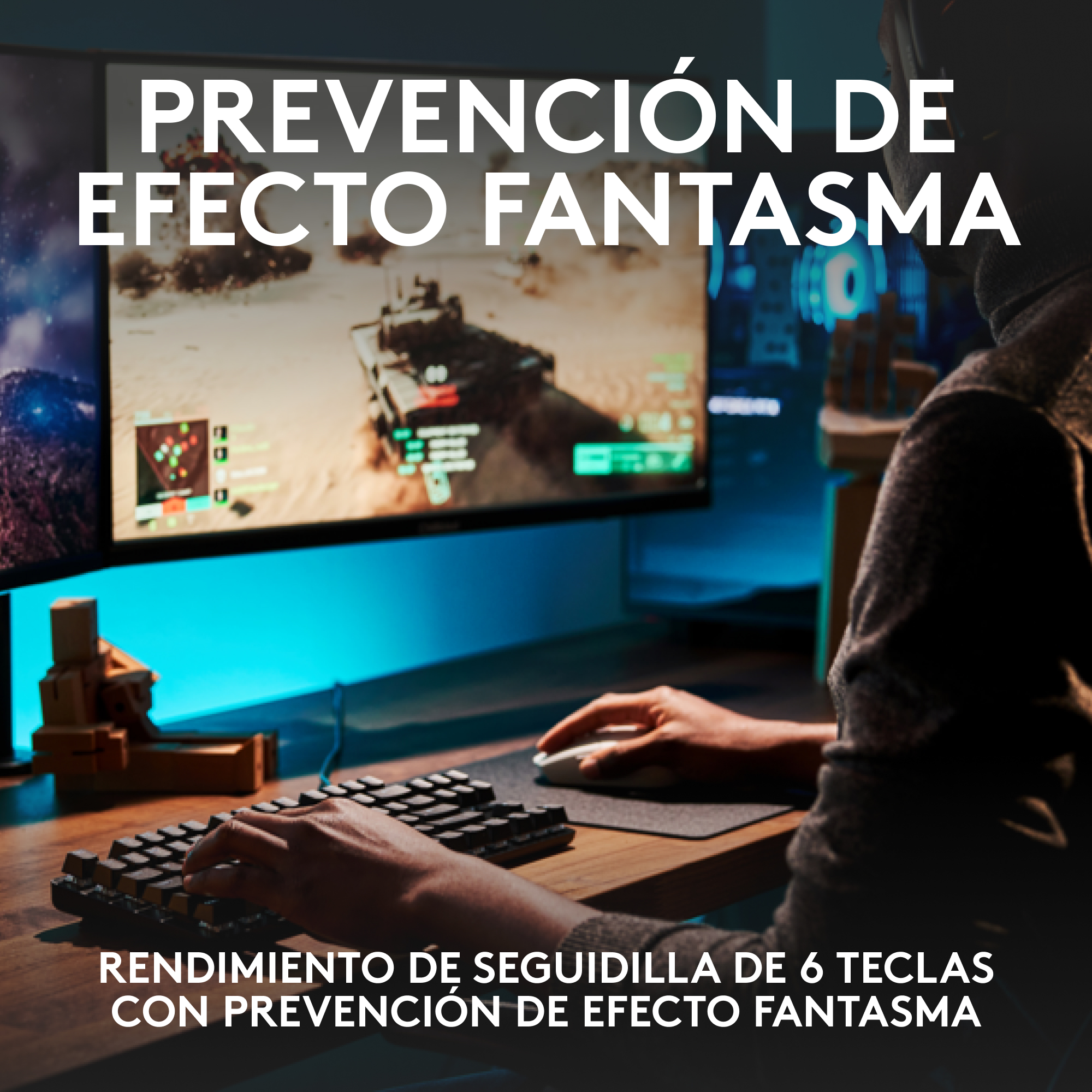 Persona usando teclado y ratón con dos monitores mostrando un juego. Texto: Prevención de ghosting.