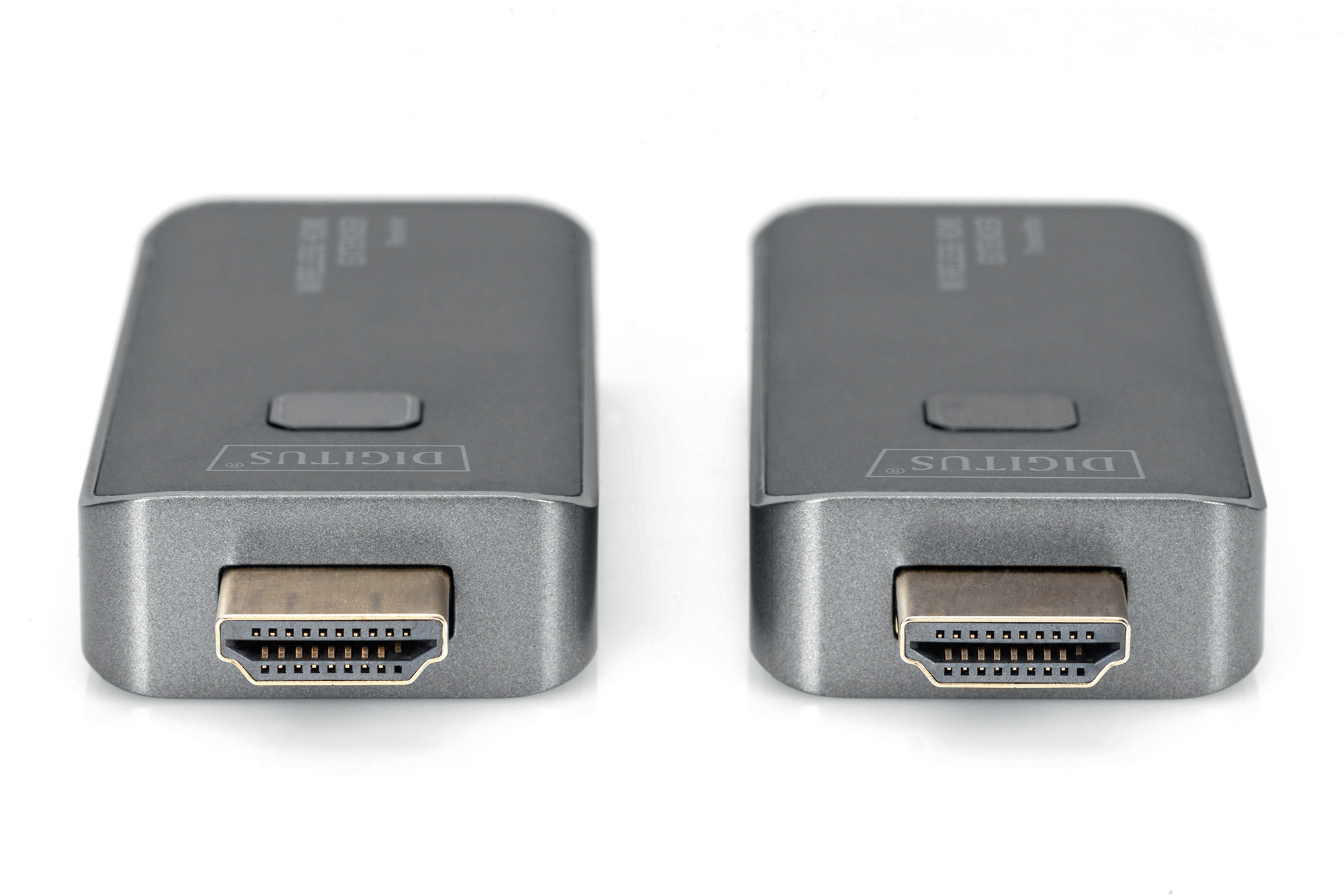 Zwei graue drahtlose HDMI-Extender nebeneinander auf weißem Hintergrund, mit sichtbaren HDMI-Anschlüssen.