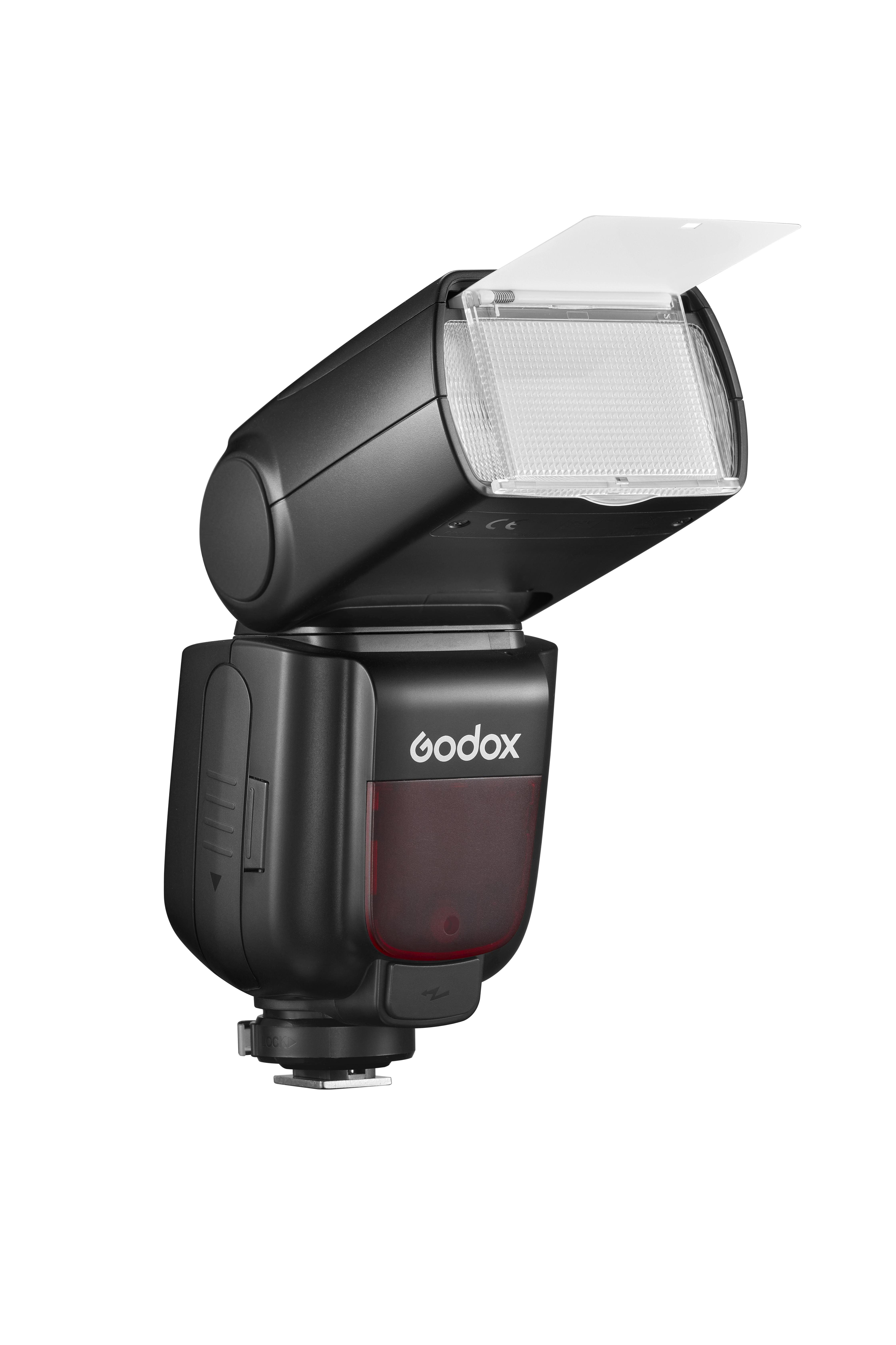 Schwarzes Kamera-Blitzgerät. Weißer Reflektor ist geöffnet. Godox-Logo sichtbar.