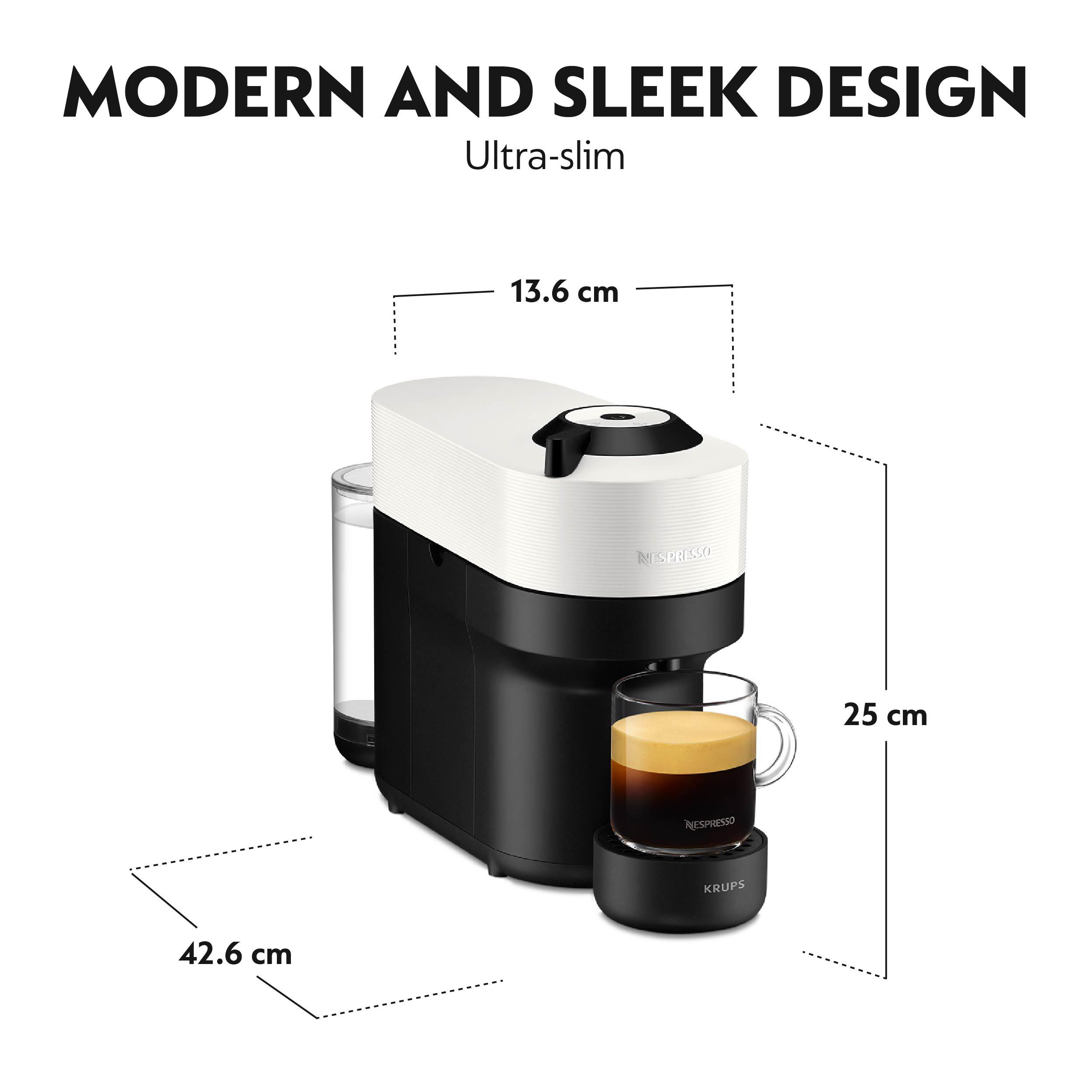 Schwarz-weiße Nespresso-Maschine mit einer Kaffeetasse.
