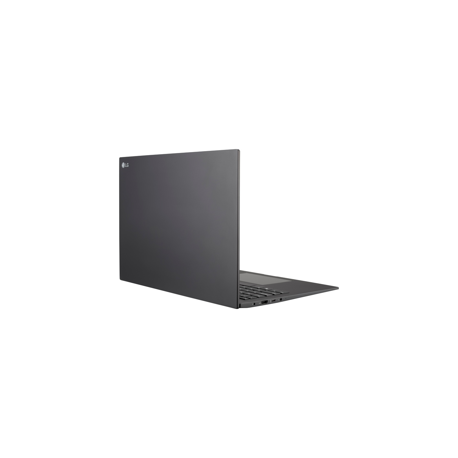 Un portátil gris oscuro, visto de lado, con el logotipo de LG visible en la tapa cerrada.