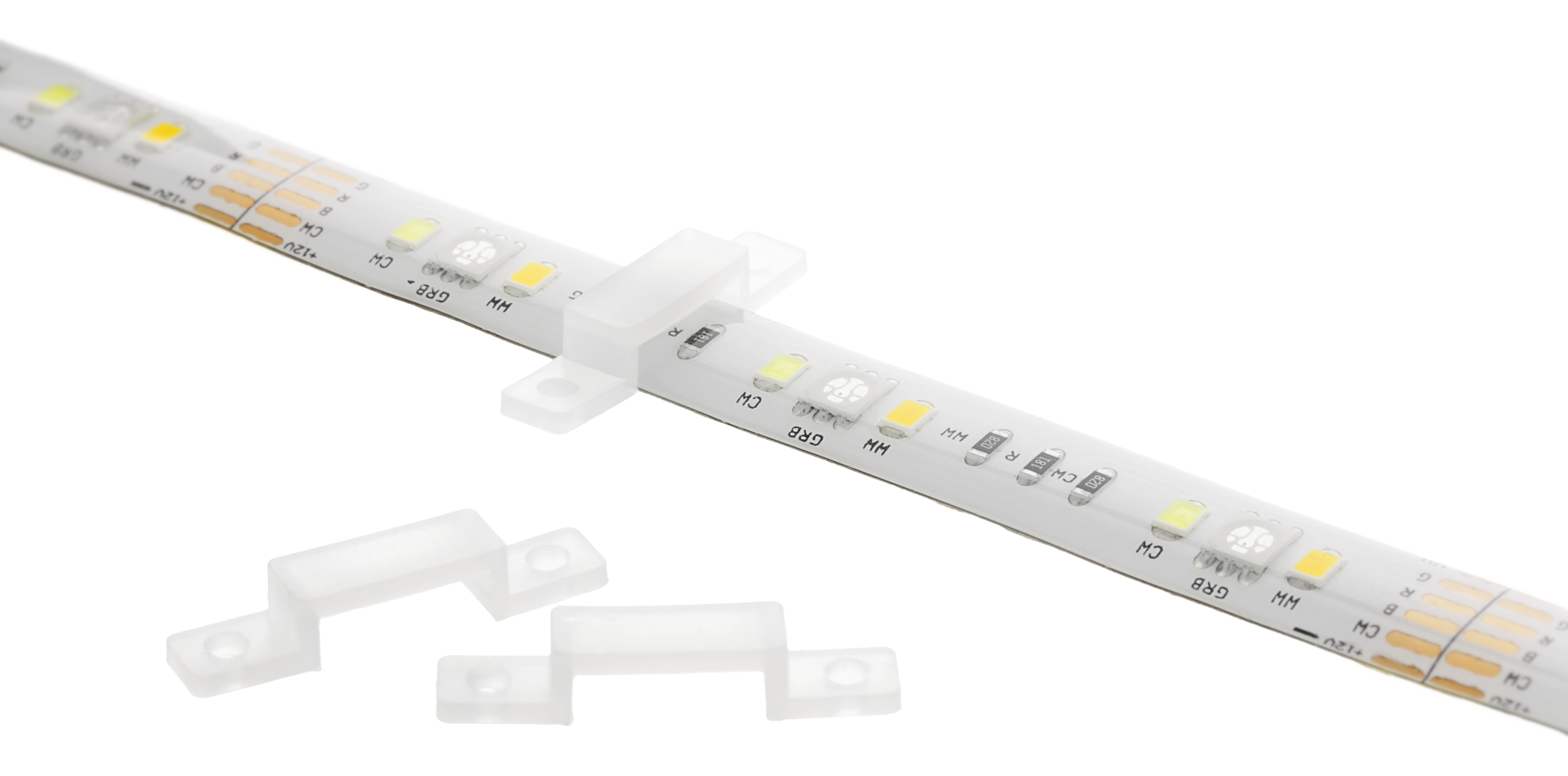 LED-Lichtband mit weißen Steckverbindern. Das Band ist abgewinkelt, die Verbinder getrennt.
