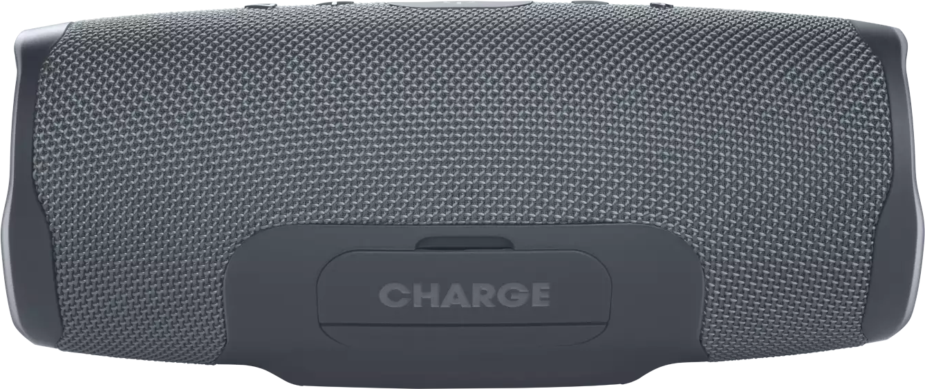 Enceinte JBL Charge grise. Tissu en maille grise avec panneau foncé avec le texte CHARGE.