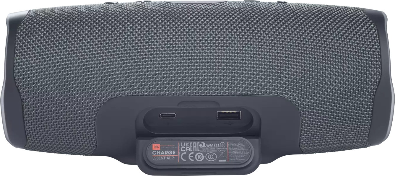 Haut-parleur gris avec dos gris foncé et logo.