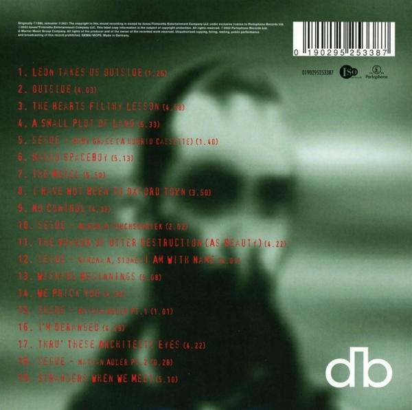 Albumcover mit verschwommenem Bild eines Mannes, Titelliste und Barcode.