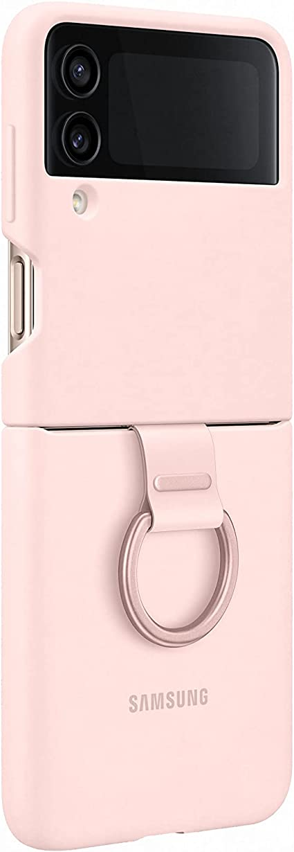 Una funda rosa plegable para teléfono con un anillo de metal.