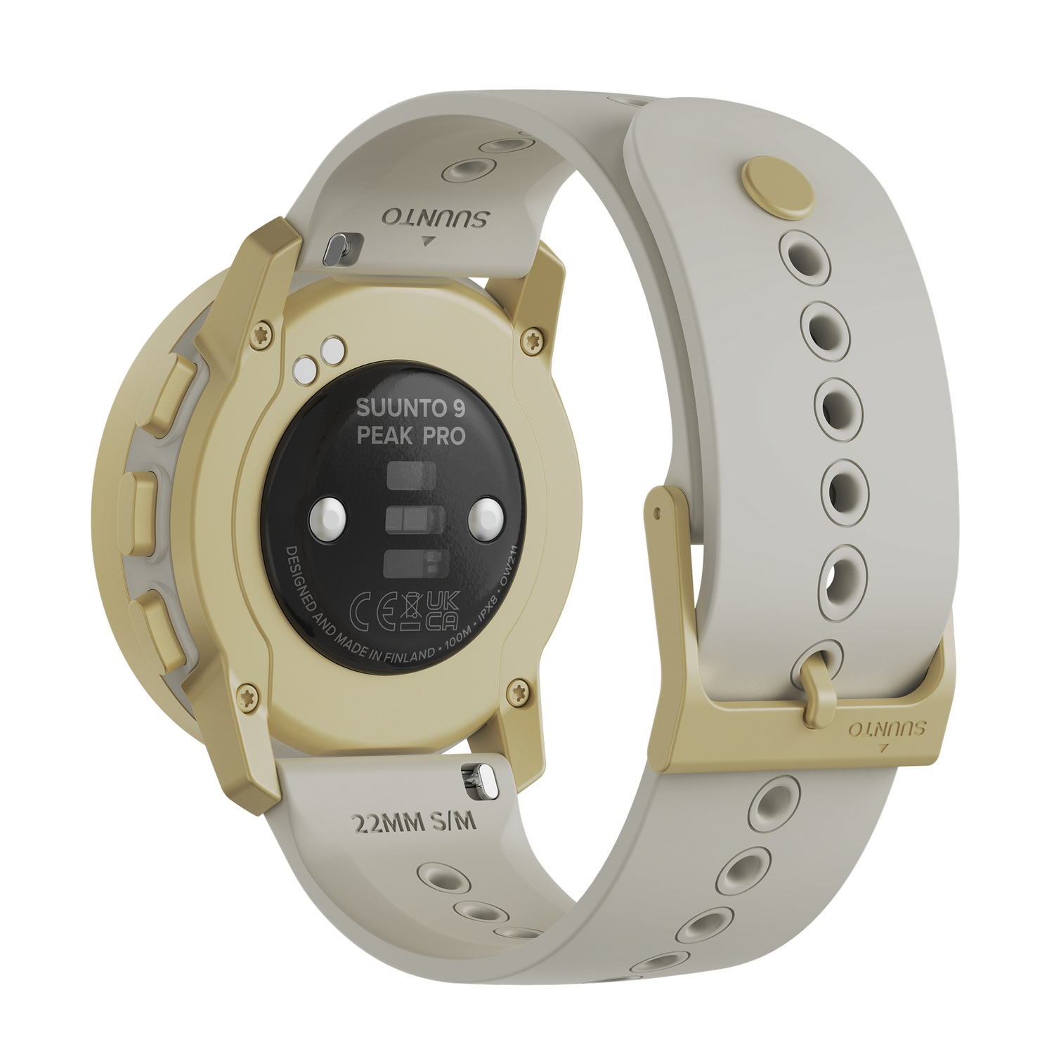 Parte trasera de un reloj Suunto dorado y blanco. Texto: 'Suunto 9 Peak Pro' y 'Diseñado y fabricado en Finlandia'.