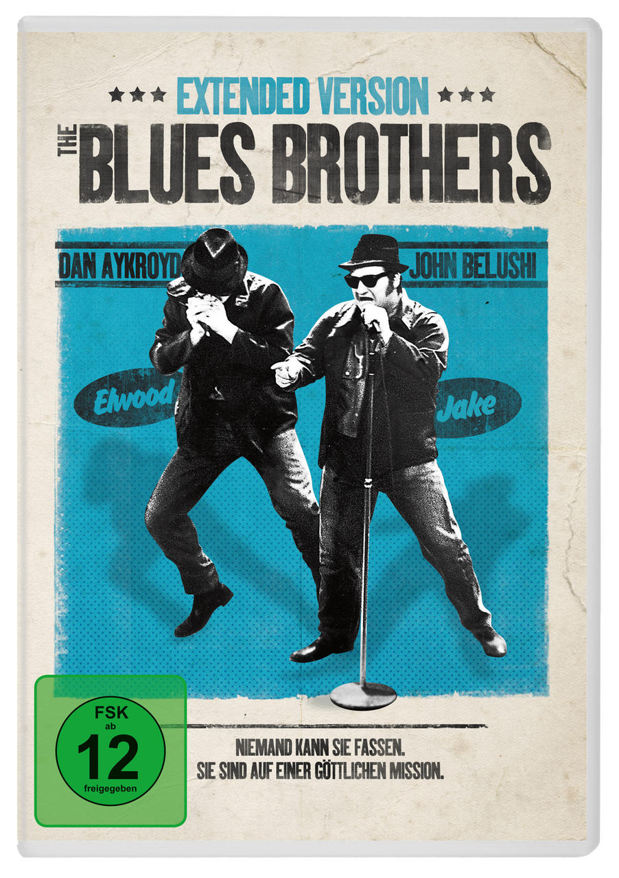 The Blues Brothers Extended Version DVD-Cover. Zwei Männer in schwarzen Anzügen und Hüten performen mit einem Mikrofon.