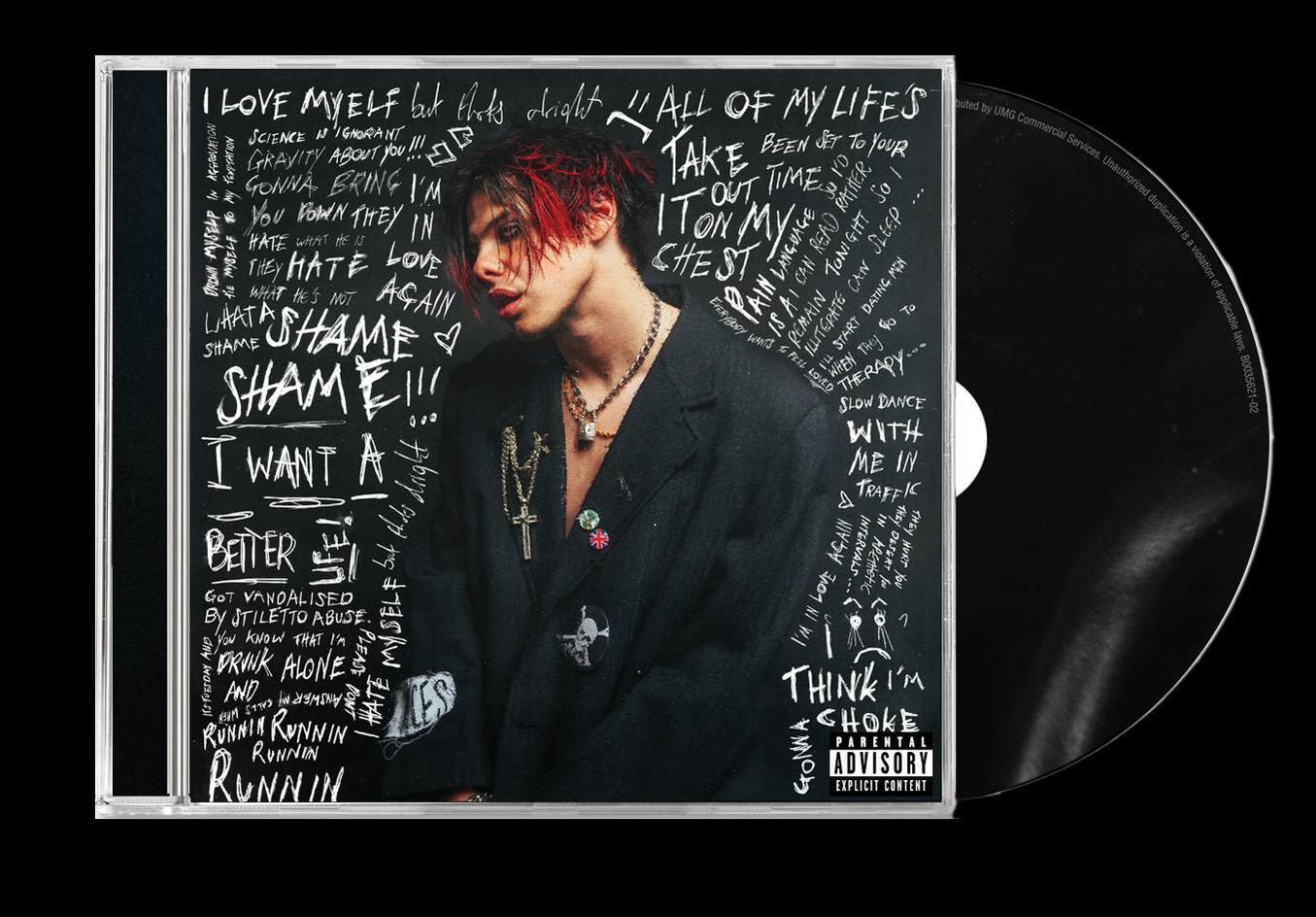Albumhoes met een man met rood haar en tatoeages.