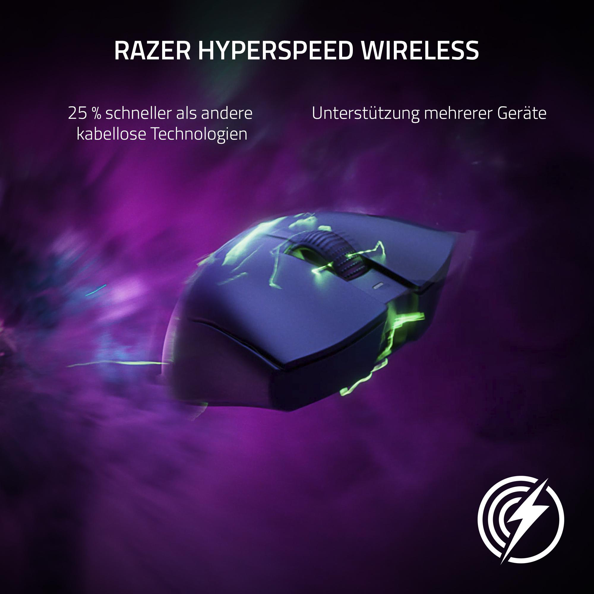 Eine schwarze Razer-Maus mit grünen Akzenten vor einem lila-blauen, rauchigen Hintergrund dargestellt.