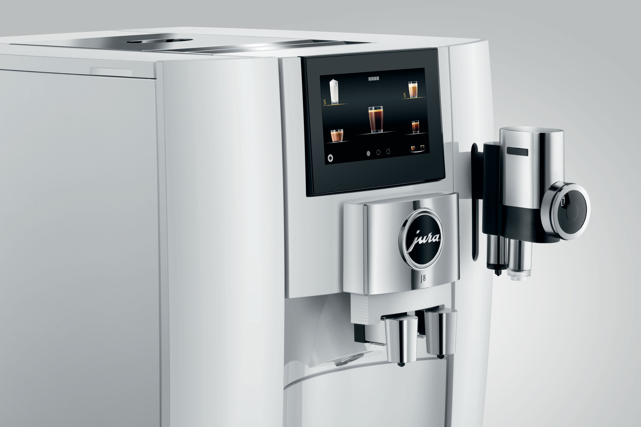 Weiße JURA Kaffeemaschine mit Display und Chromakzenten, Nahaufnahme.