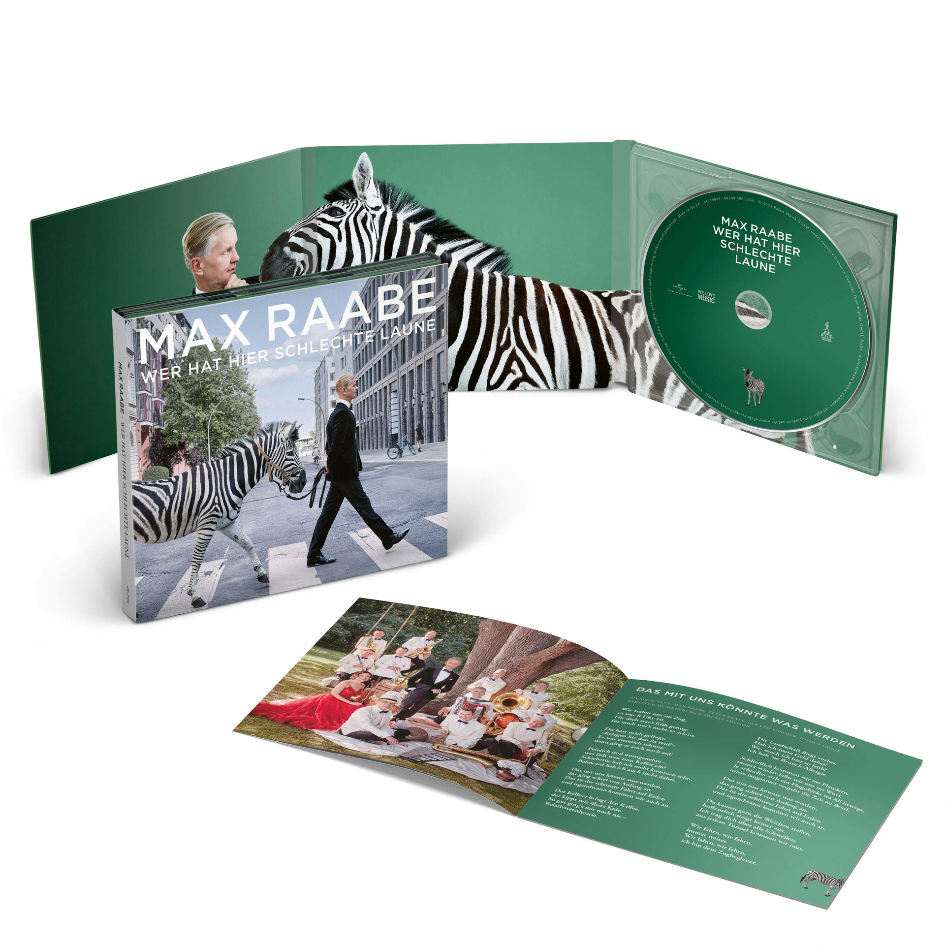 Ein CD-Album mit Max Raabe und einem Zebra auf dem Cover, mit offenen Seiten und einer Disc.