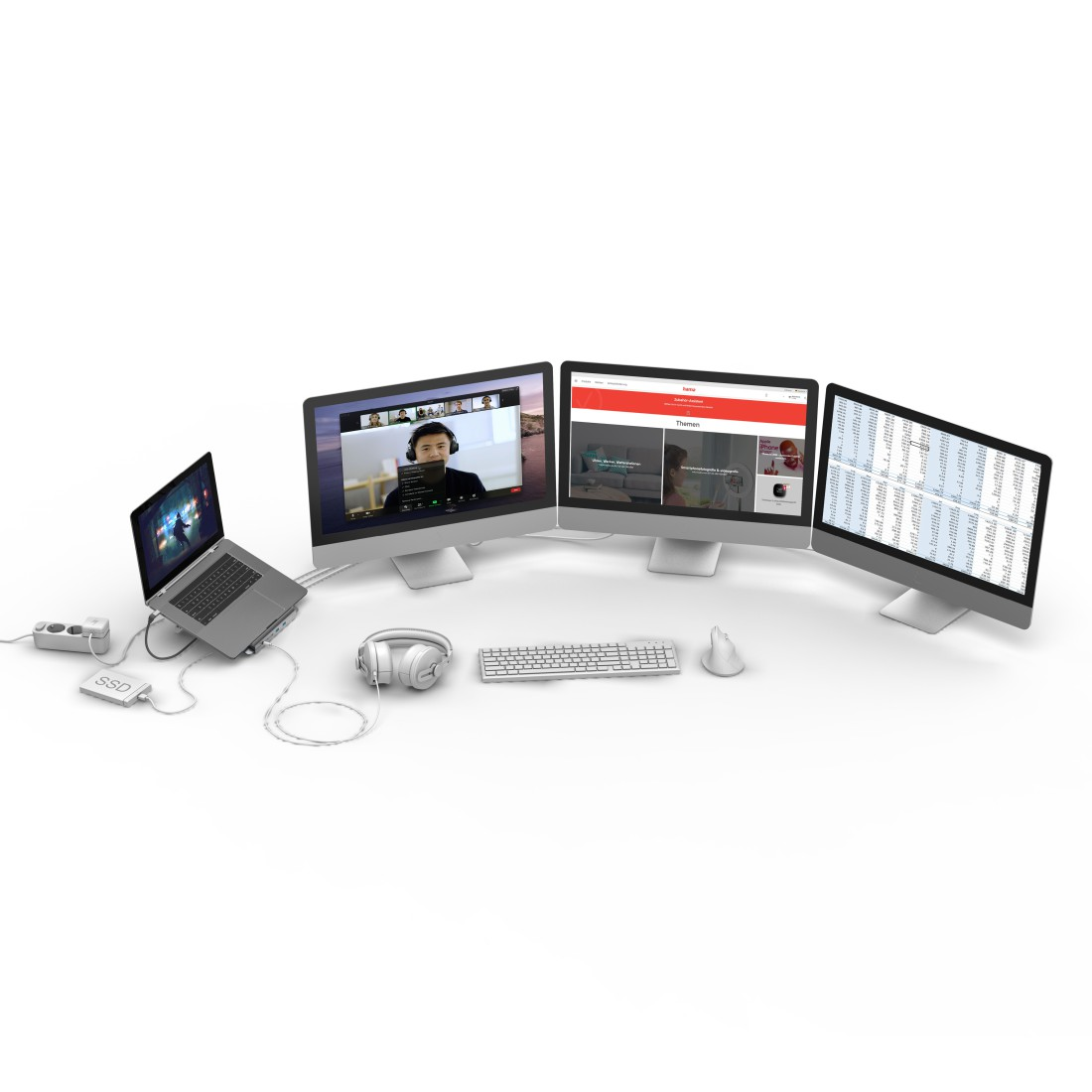 Vier Computermonitore, die verschiedene Anwendungen anzeigen, mit einem Laptop und Zubehör.