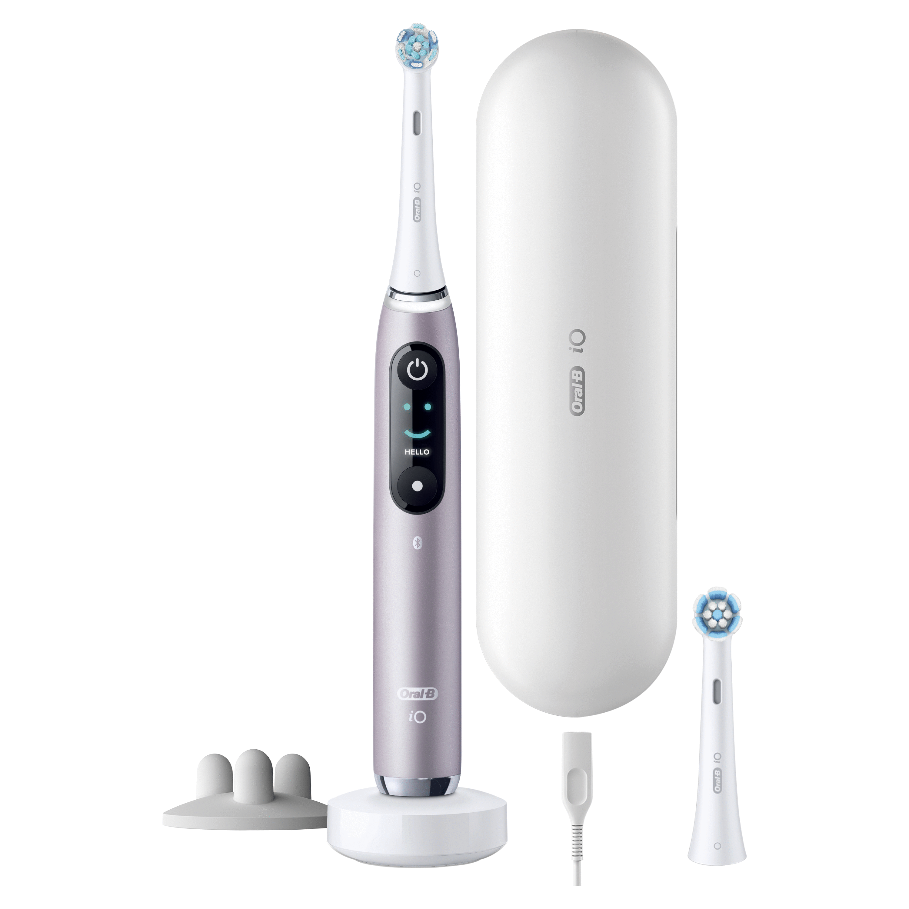 Oral-B iO elektrische tandenborstel, oplader, reisetui en opzetborstels. De tandenborstel is paars.