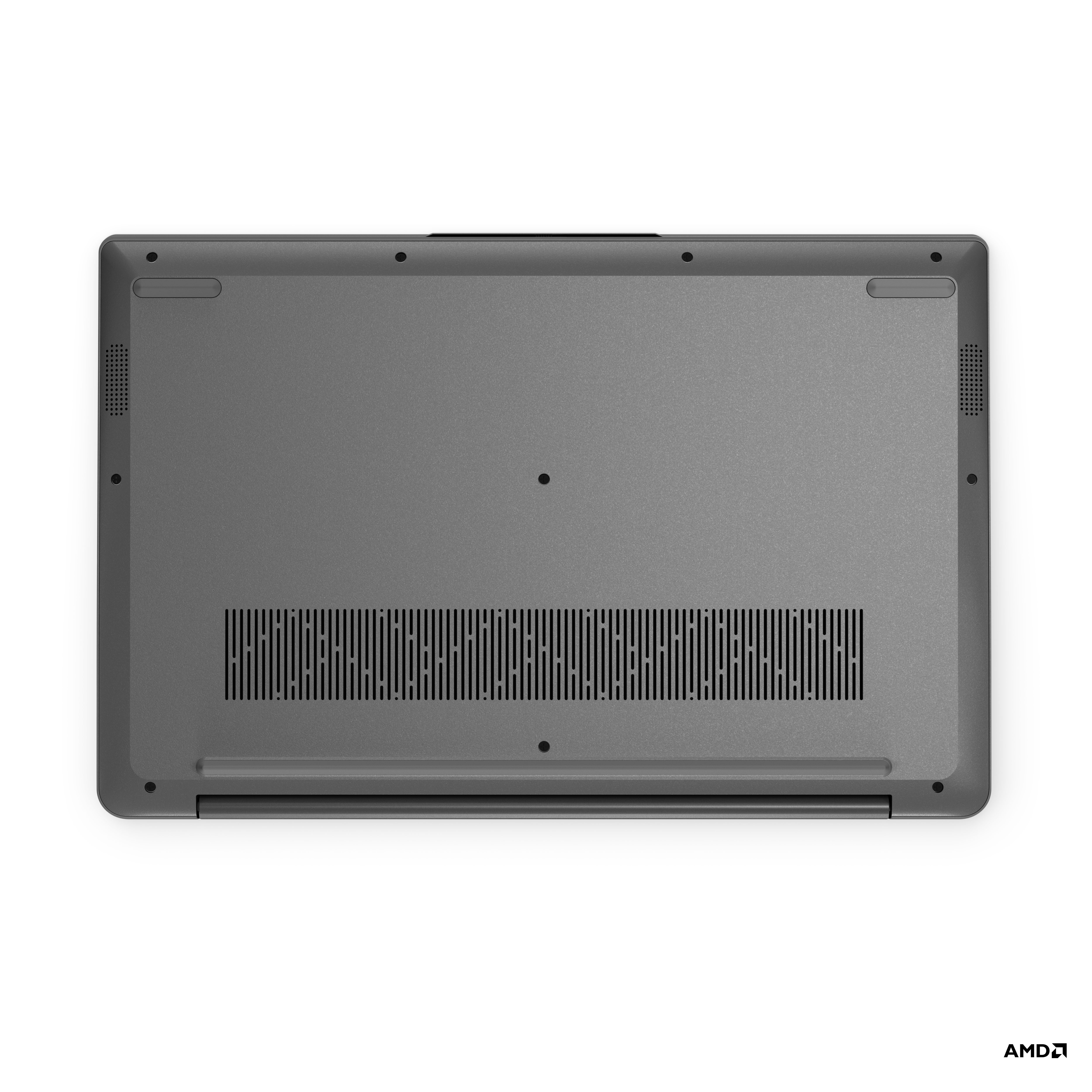 Gri laptop altı. Havalandırma delikleri, vidalar ve Lenovo logosu ile.