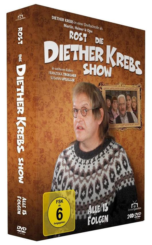 DVD-Box-Art einer Show mit einem Mann in einem Pullover und einer Brille.
