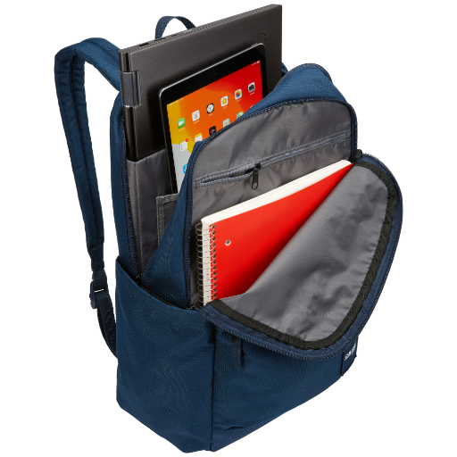 Açık lacivert bir sırt çantası, içinde bir dizüstü bilgisayar, tablet ve not defterleri.