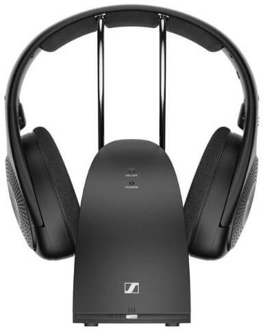 Black headphones on a charging station. The charging station has the Sennheiser logo.