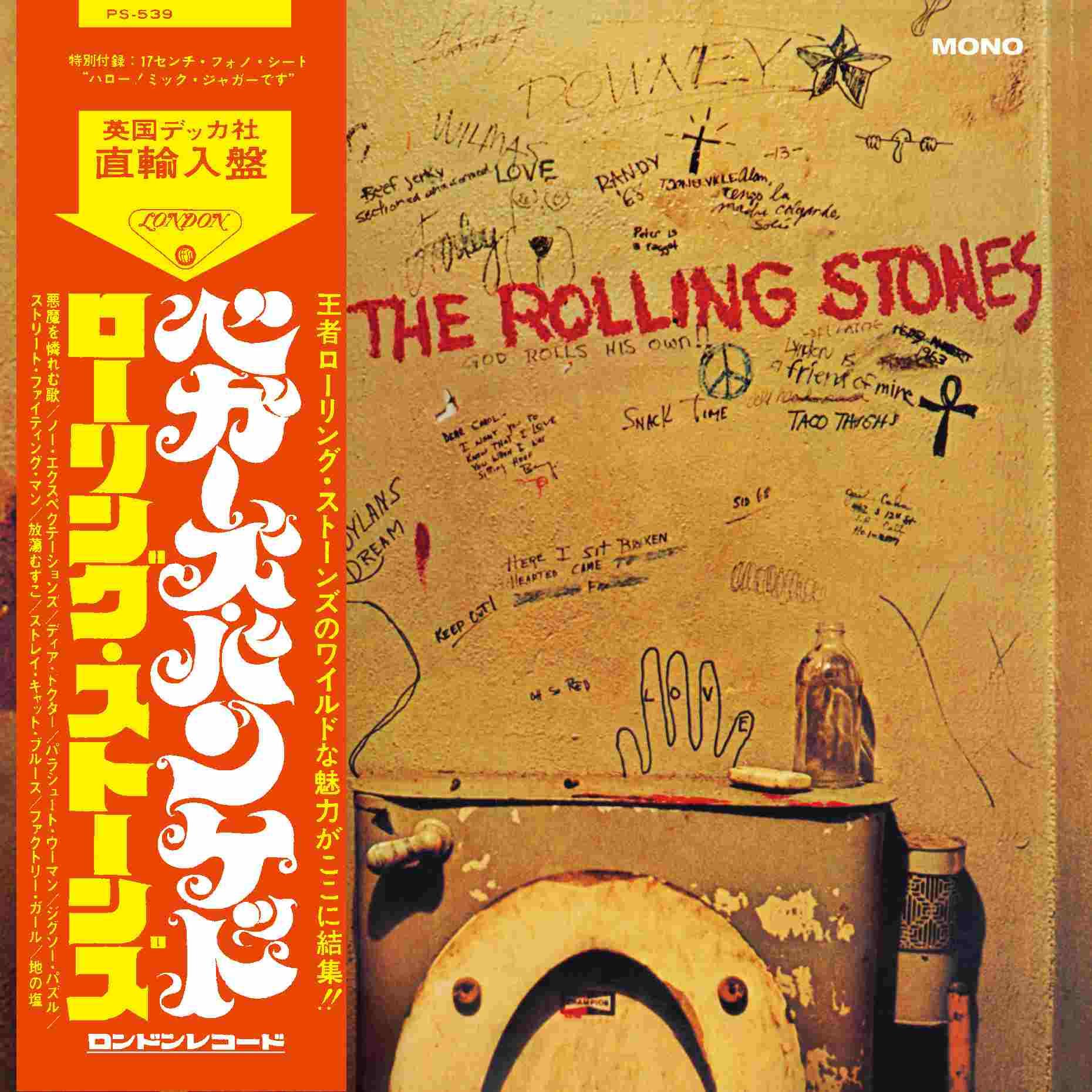 Albumhoes van The Rolling Stones, met graffiti-muurkunst met tekst en tekeningen.