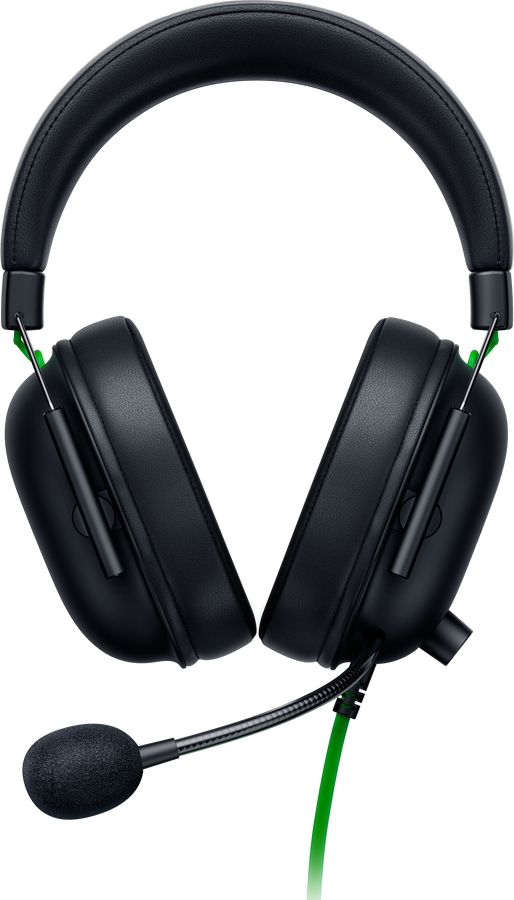 Casque gaming noir avec des touches de vert.