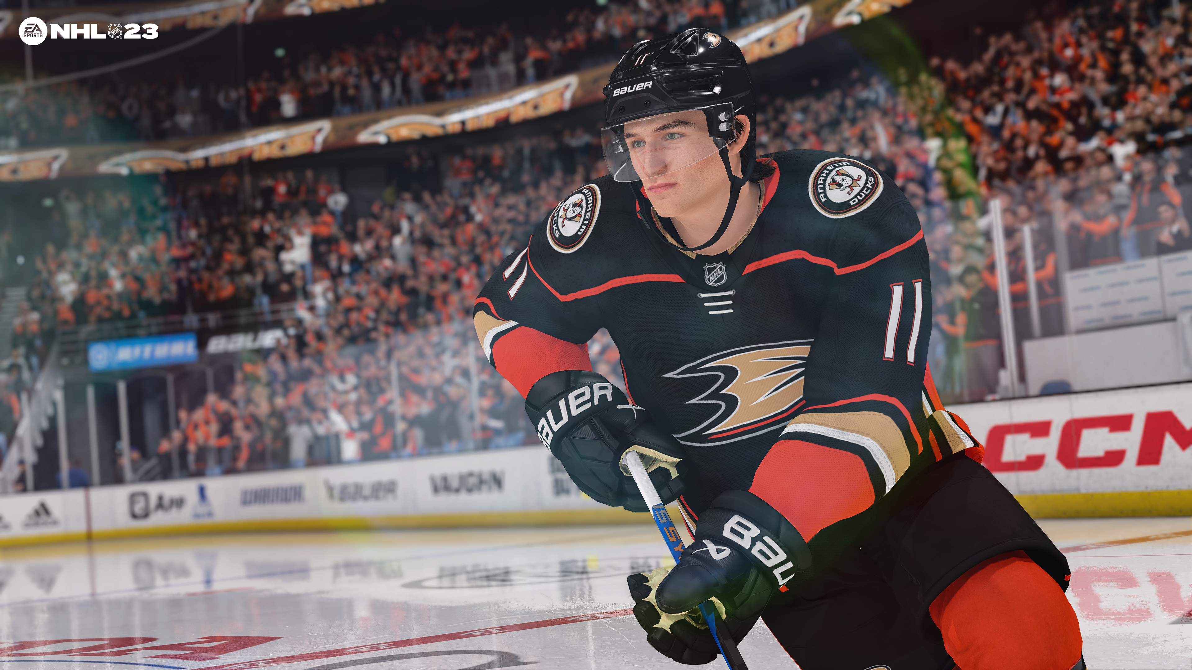 Ein Hockeyspieler in einem Spiel, der ein Ducks-Trikot trägt, mit dem Spiellogo 'NHL23'.