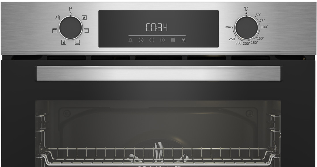 Silver oven control panel with dials, a display showing time, and a temperature dial.