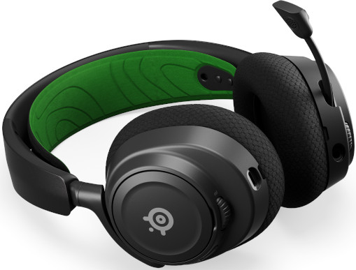Casque de jeu noir avec microphone et un accent vert.