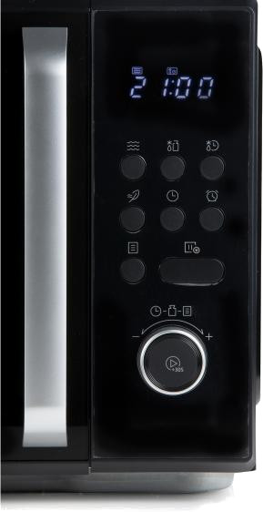 Black microwave front. Display shows 21:00. Buttons below display, a dial, and a silver handle on the side.