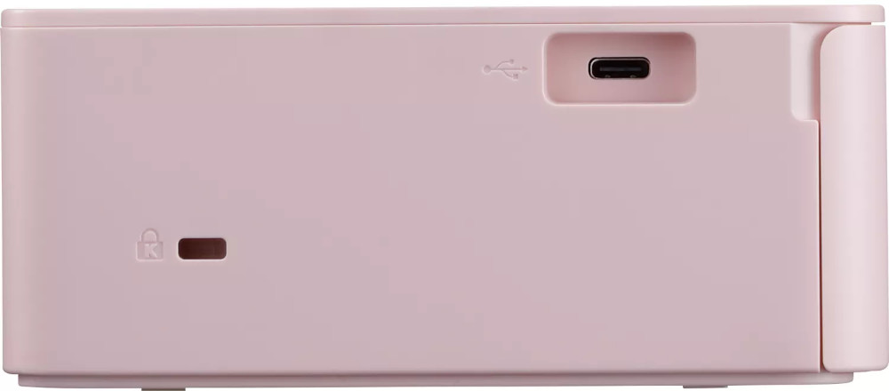 Pink printer side view, with a USB port and a power button. White background.