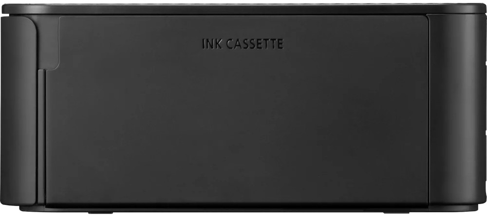Black ink cassette for a printer. The text "INK CASSETTE" is visible on the front.