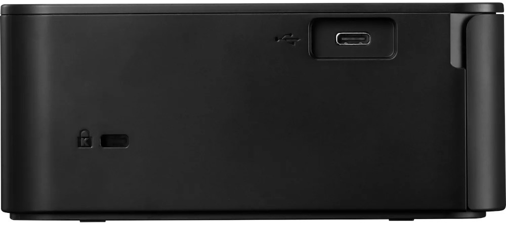 A black device with a USB port and a lock symbol, likely a storage device or similar.