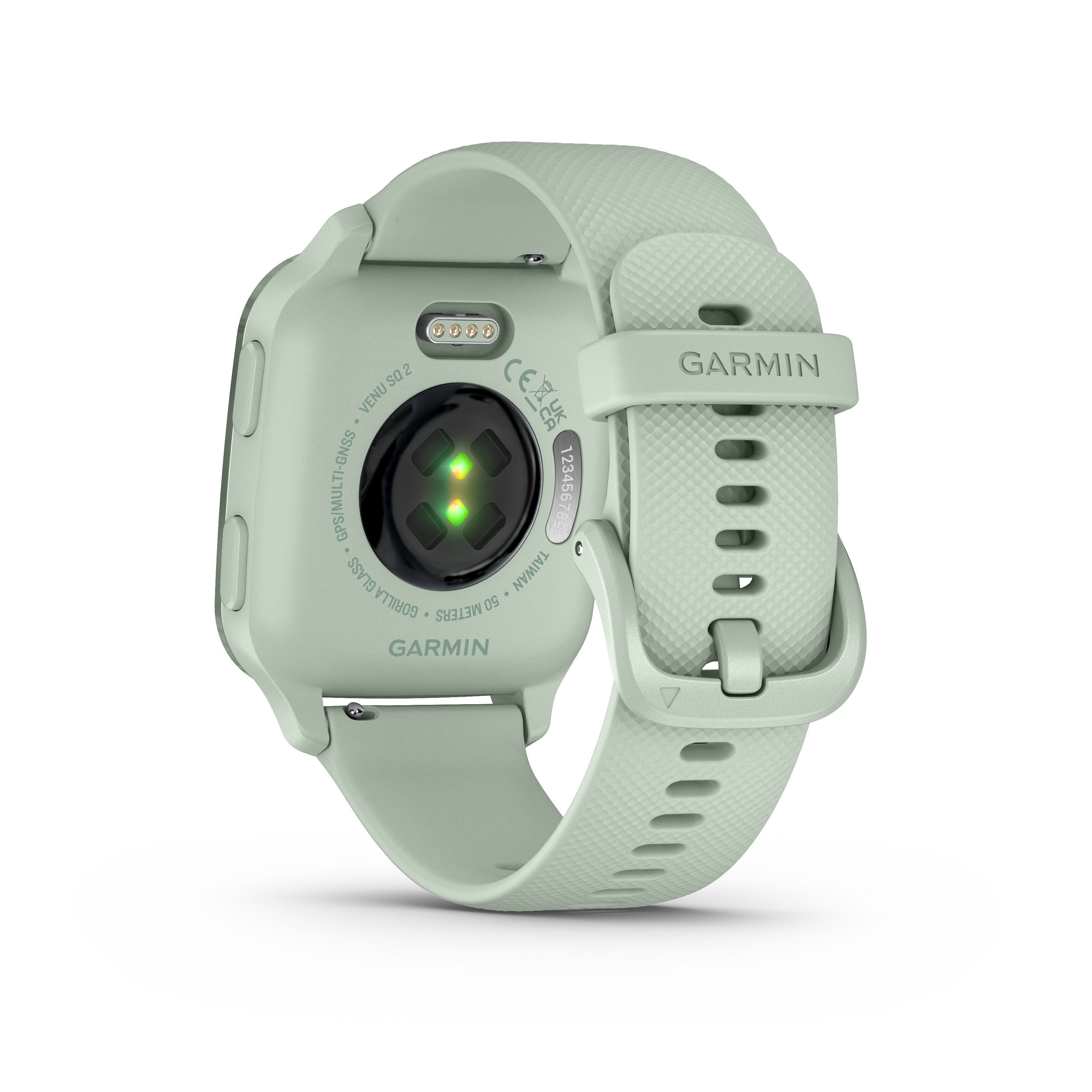 Eine Garmin Smartwatch, hellgrün mit schwarzem Sensor und Armbanddetails. Rückansicht.