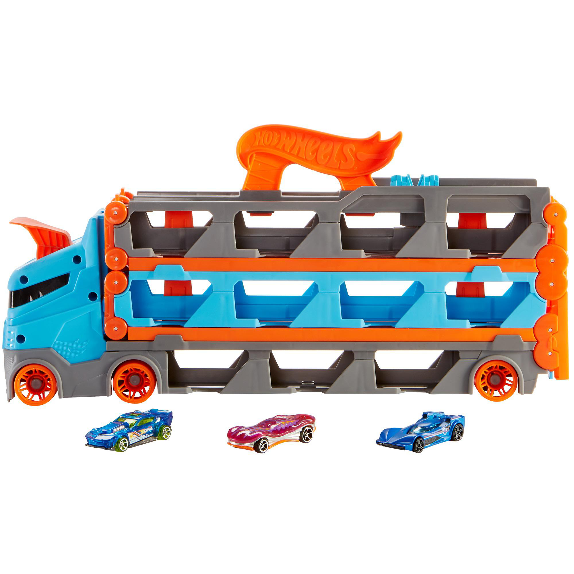 Ein Spielzeug-Lkw, der drei Spielzeugautos transportiert.