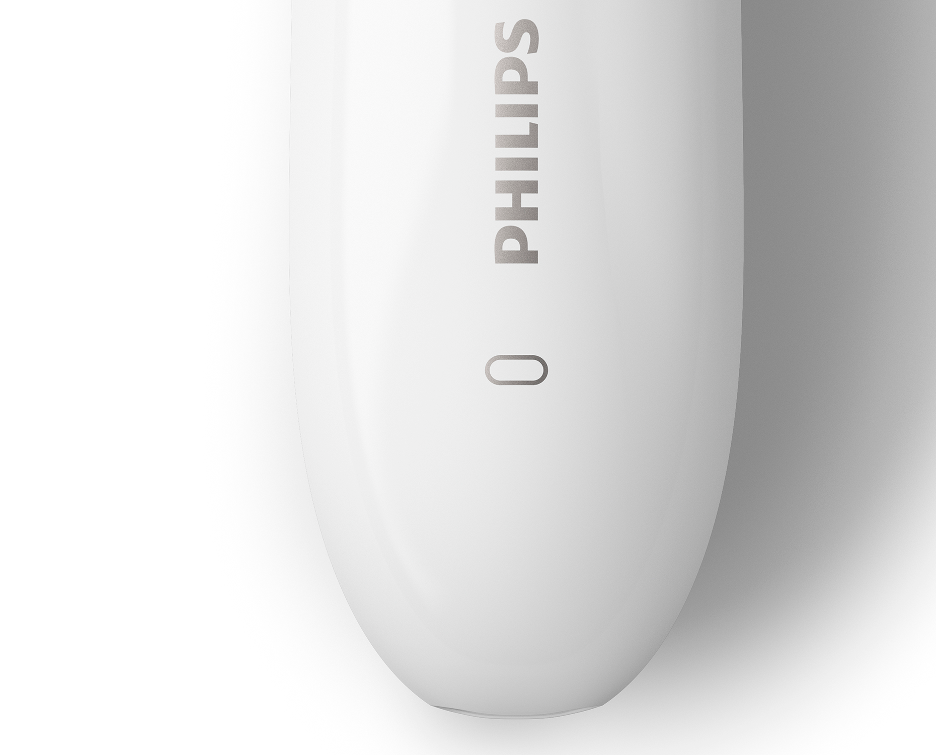 Witte elektrische scheerapparaat met een Philips-logo. Witte achtergrond.