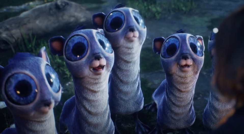 Een groep kleine, blauwe, cartoonachtige wezens met grote ogen en een blije uitdrukking.