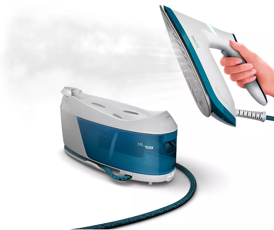 Ironing machine with a blue water tank and a hand holding an iron above it.